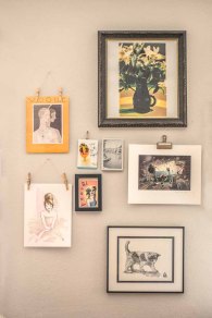 Eight prints make up a gallery wall in Stephanie's office.